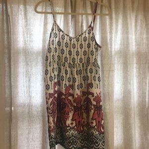 Loose summer dress with crotchet trim.